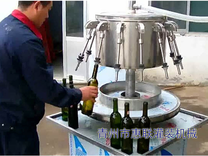 半自動虹吸式液體灌裝機(jī)